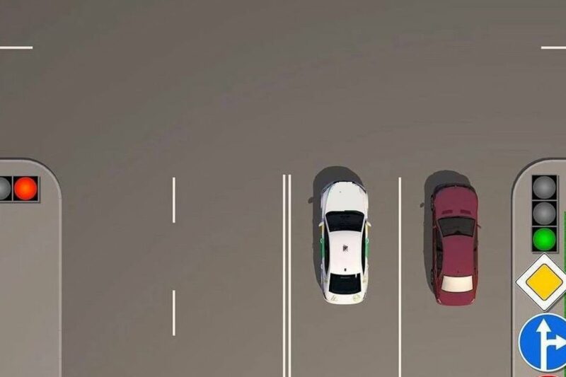 Чи дозволено розворот білого автомобіля на перехресті?