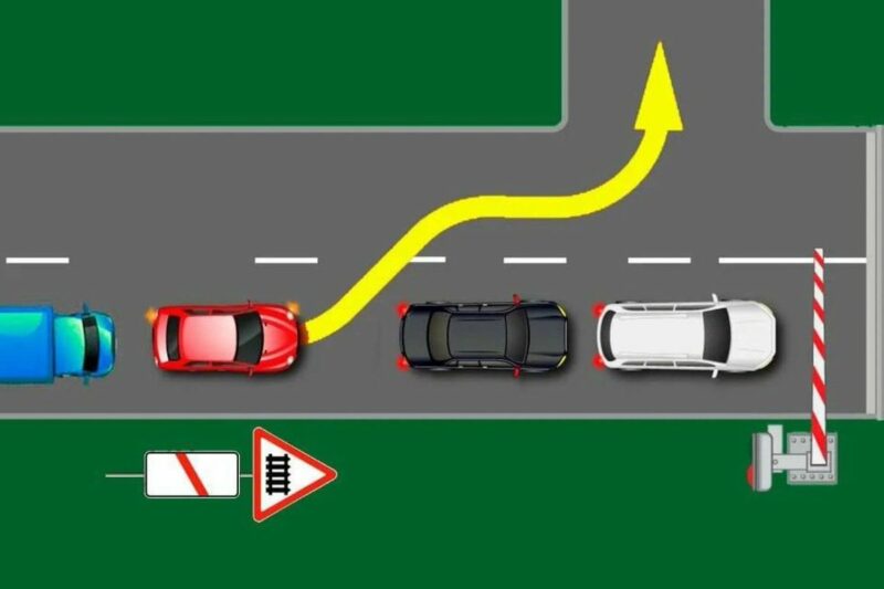 Чи може водій червоного авто повернути ліворуч?